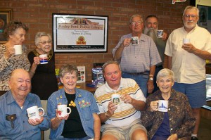 Love Mug, October 4 thru 9, 2010; Is own by Sharayan Arellano, she has a variety of drinks from HOT DRINKS TO COLD DRINKS ALSO INCLUDES SMOOTHIES. Showing off there mugs are the Friends of the Library: Nancy Collier, Marge Jung, Ralph Merklinger, Ed Brown, Ron Gerboth, Dub Couch, Charlene Lindahl, Richard Power, Mary Lou Wolfson.