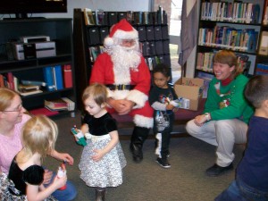 children, parents, Santa Claus and story teller at the library